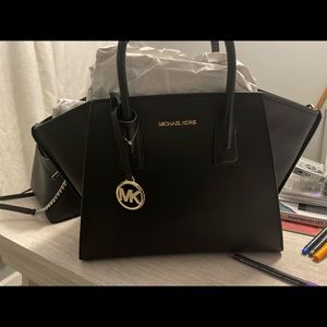 Brand new with tags Michael Kors hand bag.